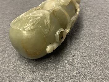 A Chinese gourd-shaped celadon and russet jade snuff bottle, Qing